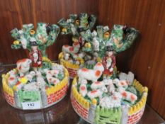 Three reproduction Staffordshire style tableau figures