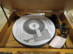 A reproduction turn table radio/cd cassette player