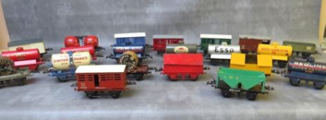 TWENTY TWO PIECES OF UNBOXED O GAUGE ROLLING STOCK, to include tankers, covered and uncovered