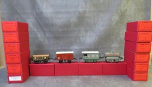 SIXTEEN BOXED HORNBY O GAUGE ROLLING STOCK, to include tankers, covered and uncovered wagons