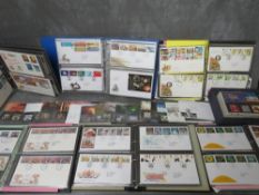 SIX ALBUMS OF FIRST DAY COVERS, mainly 1980s / 1990s, together with a Royal Mail Millenium