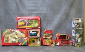 A SELECTION OF BOXED AND UNBOXED MAINLY BRITAINS TOYS, to include Volvo tractor, animal pens, farm