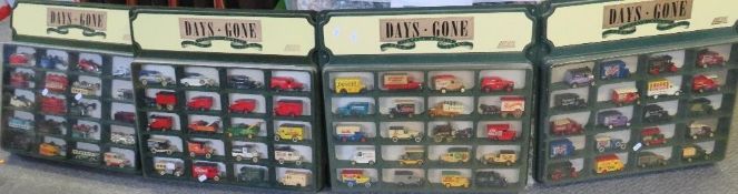 FOUR DAYS GONE CAR WALL SHELVES, each containing twenty die cast vehicles