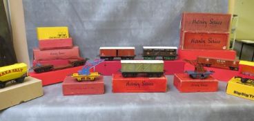 SEVENTEEN BOXED MAINLY HORNBY O GAUGE PIECES OF ROLLING STOCK, to include cattle trucks, crane