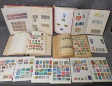 FIVE STAMP ALBUMS CONTAINING BRITISH / WORLD STAMPS, together with a small collection of loose