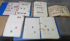 FIVE WORLD STAMP ALBUMS, containing many stamps from the 1800's, some as early as the 1850s and