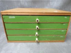 WOODEN FOUR DRAWER CHEST FULL OF MECCANO