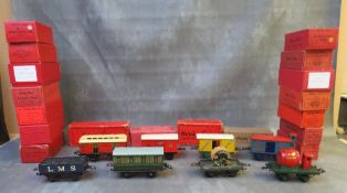 LARGE BOX CONTAINING TWENTY HORNBY O GAUGE BOXED ROLLING STOCK, to include luggage van, gunpowder