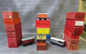 SIXTEEN BOXED MAINLY HORNBY O GAUGES PIECES OF ROLLING STOCK, to include guards van, passenger