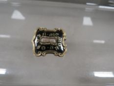 A 19th century mourning brooch with inscription dated 1837