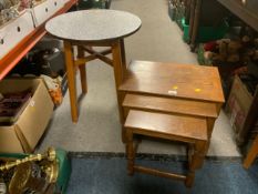 An oak nest of three tables together with a pub style table with formica top. (2)