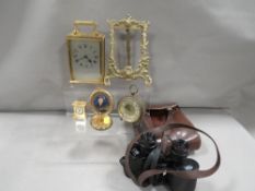 A tray of assorted collectables to include pocket watches and clocks