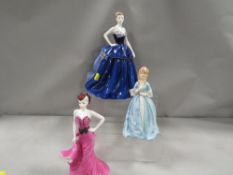 A limited edition Coalport figurine 