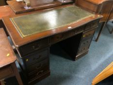 A reproduction mahogany twin pedestal desk with leather top W 121 cm