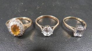 Three hallmarked 9ct gold dress rings, all size L, total weight approx 5.4 g
