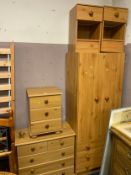 A modern combination wardrobe, chest and three bedside units