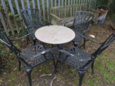 A cast aluminium gardne table and four chairs