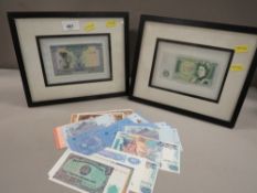 A collection of world banknotes, loose and in frames, to include uncirculated examples