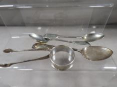 A small pair of silver sugar tongs, silver napkin ring etc
