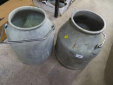 Two aluminium milk churns