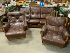 A mid century teak G-Plan three piece suite