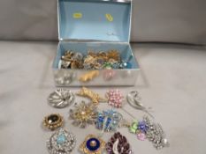 A box of vintage costume jewellery