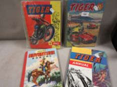 A collection of vintage annuals to include a 1958 Tiger annual (4)