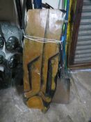 A large stone type statue of two tribal heads - H 100cm, W 30 cm