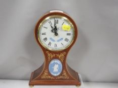 A balloon clock, inlaid wood with Wedgwood Jasperware cameo insert by Comitti of London - working