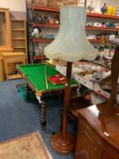 An Eastern style hardwood standard lamp and shade and a small table. (2)