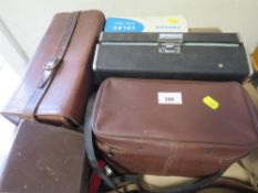 A tray of vintage film and photography equipment