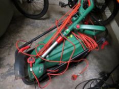 A electric Qualcast lawn mower and a strimmer