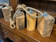 A set of four unusual door stops