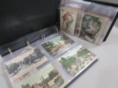 Two vintage postcard albums together with an antique family photograph album