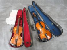 A vintage Skylark violin together with a Maidstone of London violin in cases