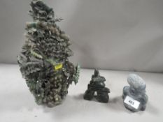 A two piece Oriental style hard stone carving of a grape vine with crickets together with a temple