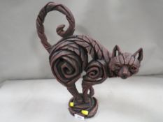 An Edge sculpture by Matt Buckley of a red cat
