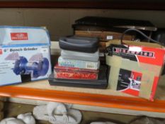A selection of tools to include a boxed bench grinder, a plunge router plus other hand tools