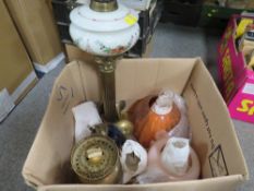 A tray of oil lamps and shades etc (unchecked)