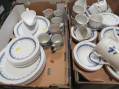 Two trays of patterned tea/dinner ware