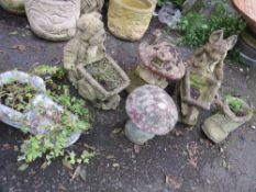 A selection of garden planters to include two mushroom statues