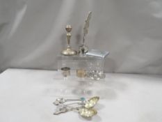 A tray of assorted silver plated ware to include a silver napkin ring