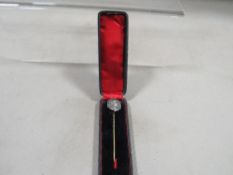 A Victorian Cravat stick pin set with Roman silver coin in original box