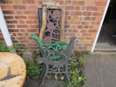 Two dismantled cast iron garden benches