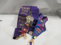 A Buffalo sash dated 1944 complete with two hallmarked silver gilt and enamel medals plus a few