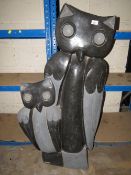A large flat back stone type statue of two owls - H 120 cm, W 60 cm
