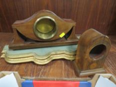 A box of antique clock and barometer parts