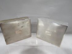 A matching pair of hallmarked silver boxes