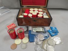 A walnut type box containing collectable British coinage