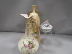 A Royal Worcester Blush ivory twin handled vase together with a damaged ewer and a small continental